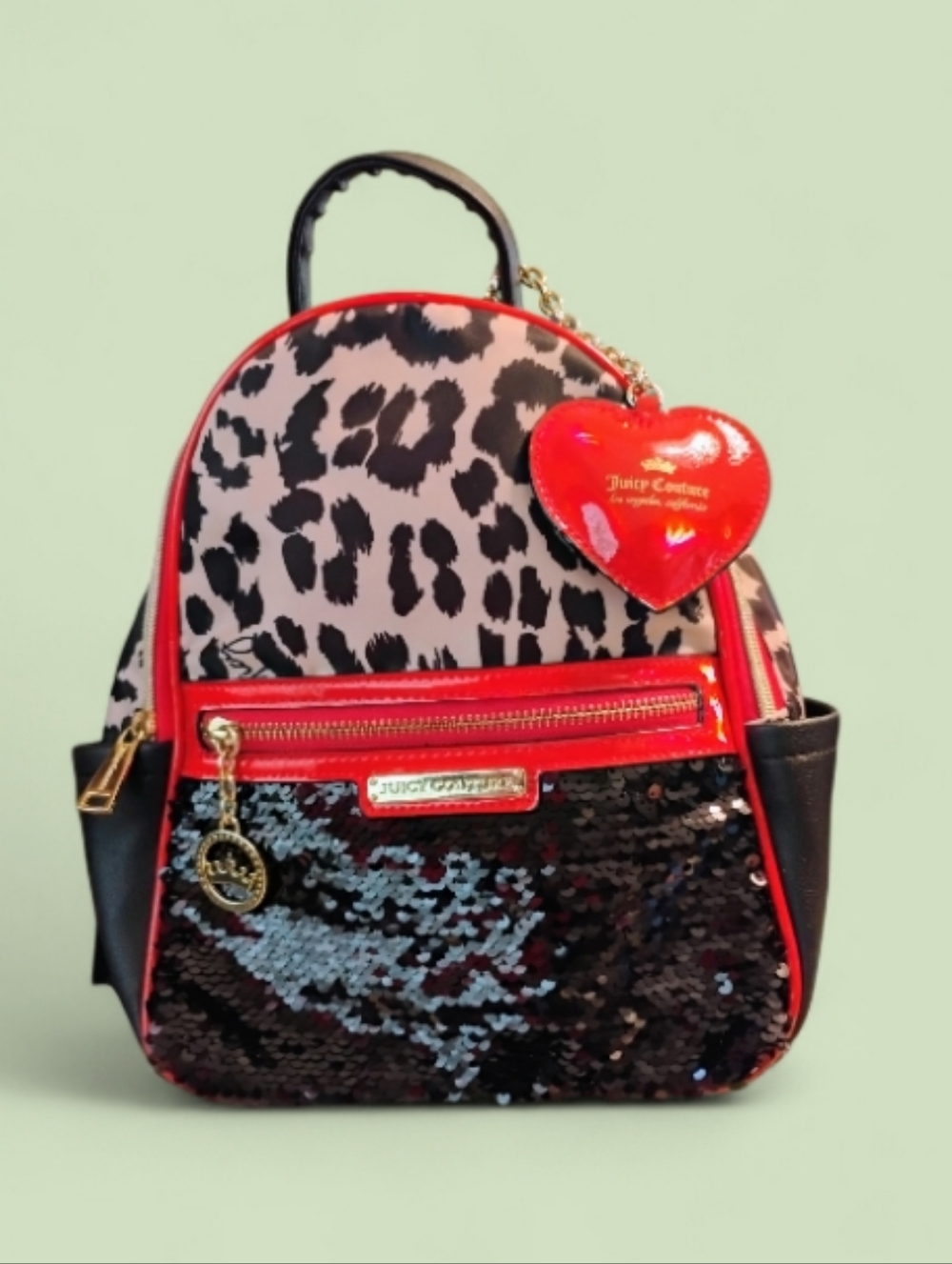 Juicy Couture Red Leopard Sequin Mini Backpack with  Heart Charm.